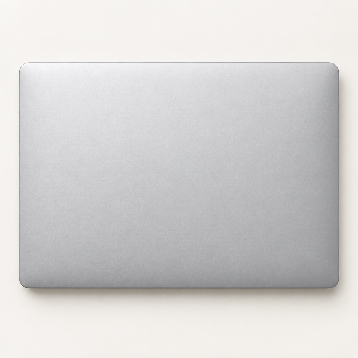 Blank silver laptop used for an illustrative sticker placement preview